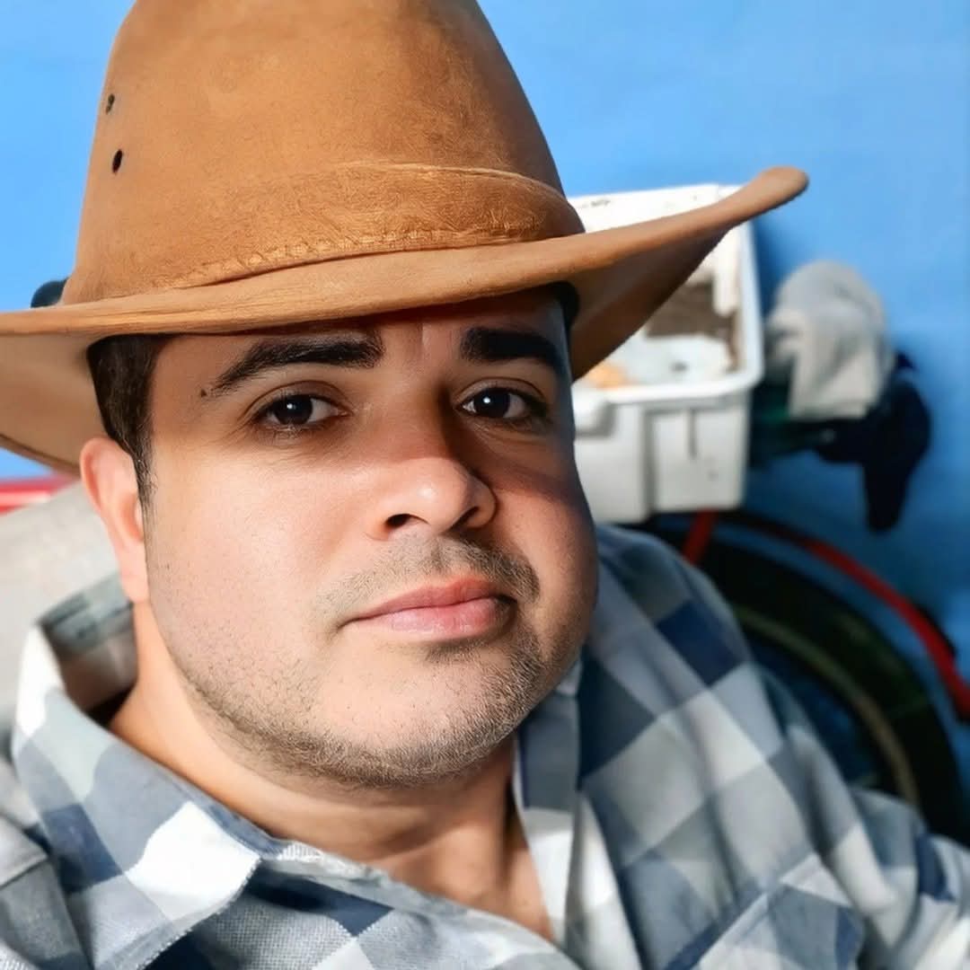TOM SOUZA